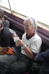 26-On the ferry to Guardería with a cup of hot chocolate